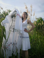 Load image into Gallery viewer, White cotton wrap dress with blue Romanian motif
