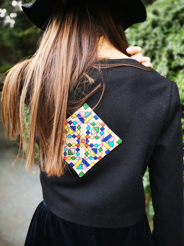 Woman coat with handmade motif on the back
